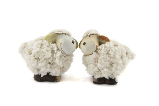 Two sheep toy isolated on the white background.