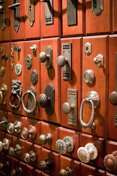 a display of old fashioned door knobs.