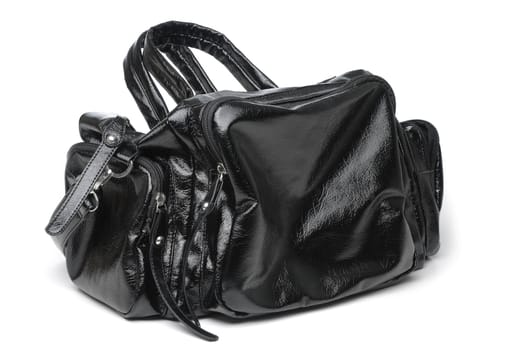 A female black handbag on isolated white background.