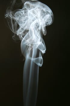 thick white smoke on black background
