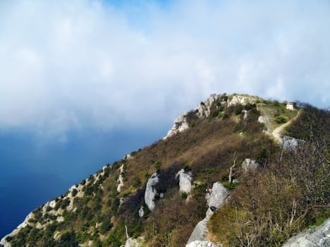 Kind from mountain on the sea in the summer