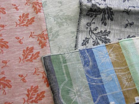 Colorful textile background - display of hand made flax linen fabrics