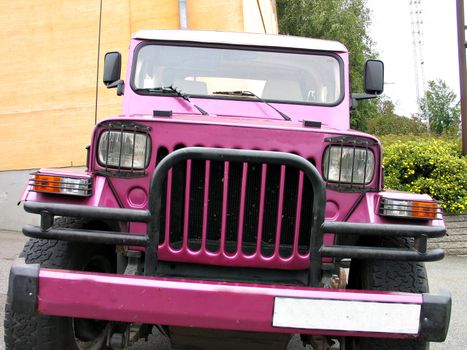 Ready for adventure - front view of a pink off road jeep