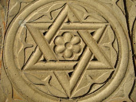 Star of David engraved in stone - symbol of Judaism