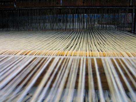 Strings in a handloom - All strings attached - Textile abstract
