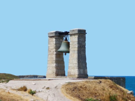 Old bell on seacoast in Chersonese Taurian in Sevastopol