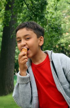 asian boy eating ice-cream