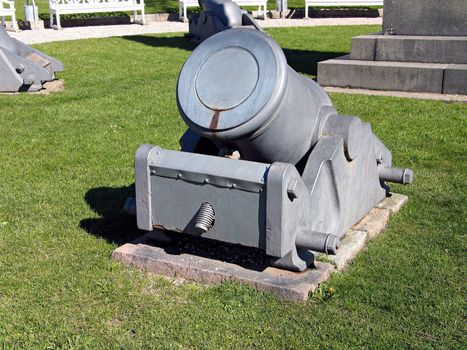 Old heavy Medieval cannon by the city walls of  Fredericia Denmark	