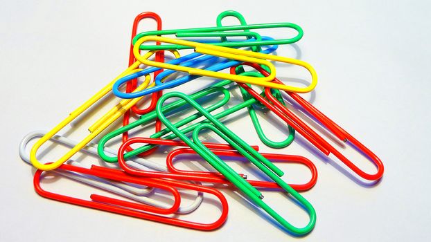 Multi-coloured writing paper clips