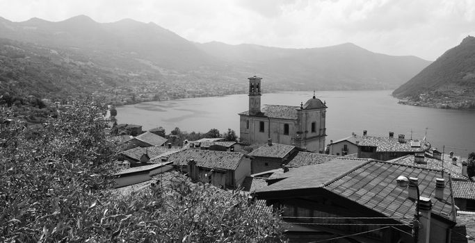 View on small village Sale Marasino with church