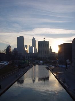 The winter sun rising over the city and the canal.