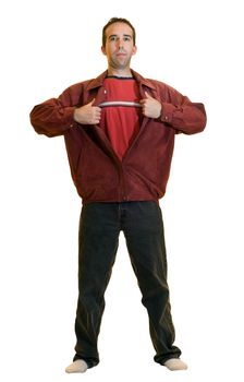 A young male ripping open a red jacket pretending to be a super hero, isolated on a white background