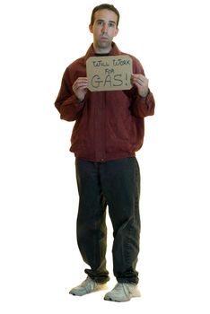 A jobless man holding a sign saying he will work for gas, isolated on a white background