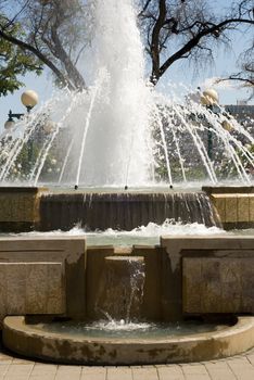Close-up of a large water fountain with the water in motion blur
