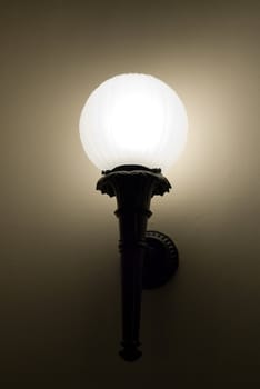 An old fashioned wall light providing illumination
