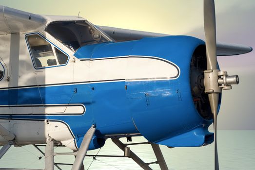 Closeup view of the front of a plane with the engine off