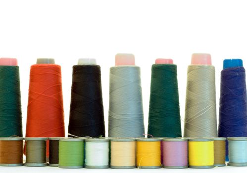 Colored sewing thread isolated on a white background