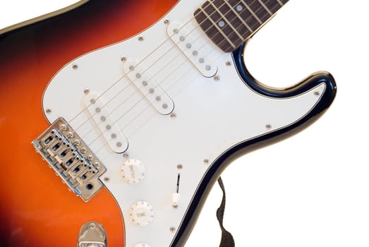 An electric guitar isolated against a white background