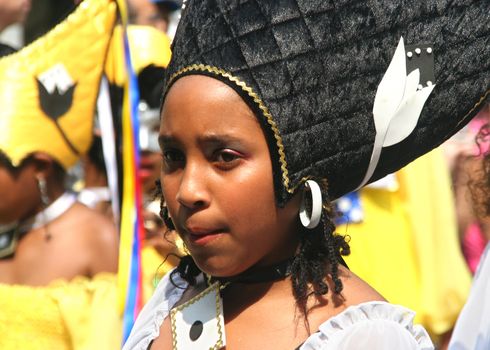 ROTTERDAM - SUMMER CARNIVAL, JULY 26, 2008. Child in the carnival parade at the Caribbean Carnival in Rotterdam.