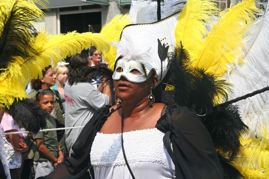 ROTTERDAM - SUMMER CARNIVAL, JULY 26, 2008. Masked carnival dancer in the parade at the Caribbean Carnival in Rotterdam.