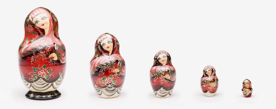 Colorful russian nesting dolls isolated on a white background