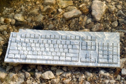 A wet keyboard thrown in the lake