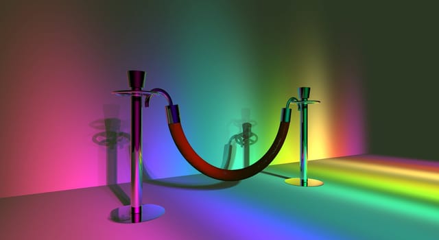 A pair of stanchion barriers lit up in rainbow lighting.