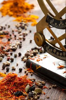 Antique scales, saffron, pepper and other spices