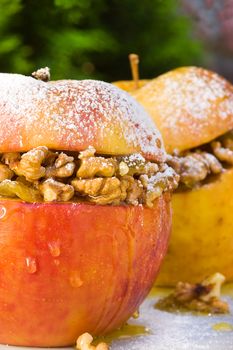Close up of apples with honey and walnuts