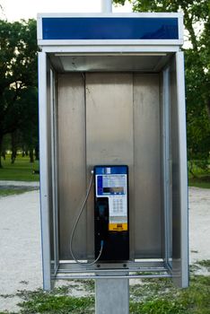 An open style telephone booth outside