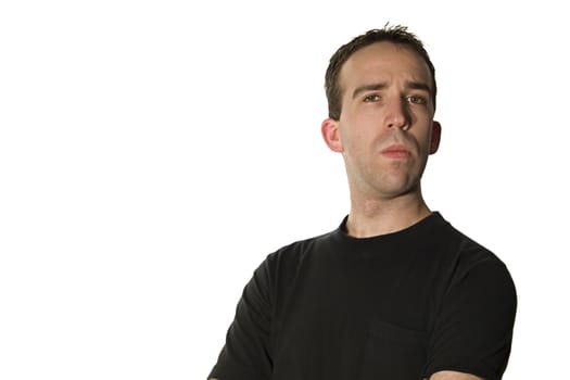 Young man pretending to be cool, wearing a black t-shirt