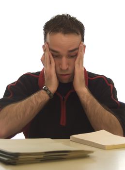 Worker experiencing stress from his paperwork