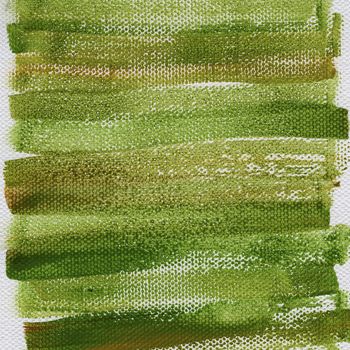 green and brown grunge watercolor abstract on artist canvas with a coarse texture, self made by photographer