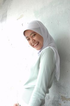 portrait of islamic southeast asian teenage girl with using jilbab