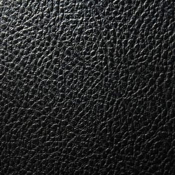 black leather texture background or wallpaper with copyspace