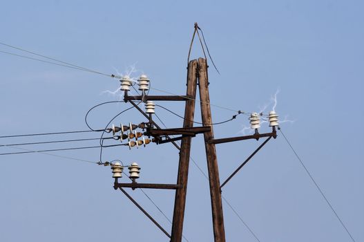 Detail of the old power-transmission pole - electric power line - short circuit