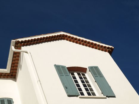 a house close-up image with blue sky