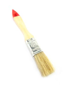 a wooden paintbrush over a white background