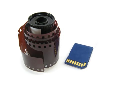 lense and memory card over a white background