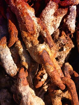 an image of some rusty chain links