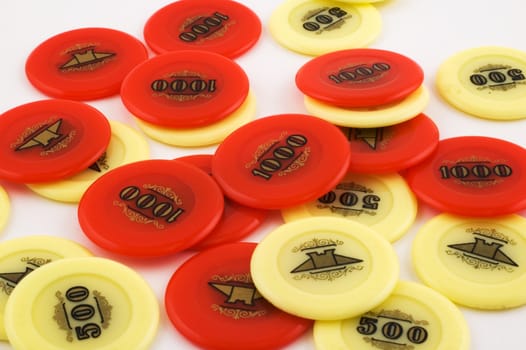 Heap of red and yellow casino chips 