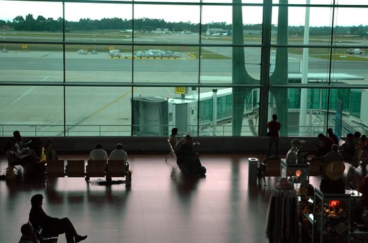 people silhouette in s� carneiro airport, oporto, portugal