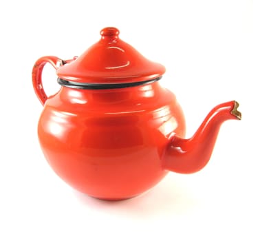 a red teapot over a white background