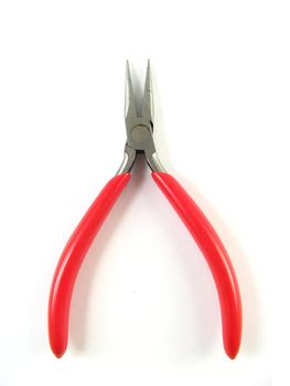 some red pliers over a white background