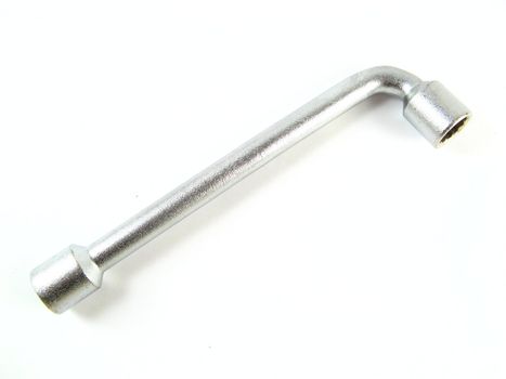 image of a spanner over a white background