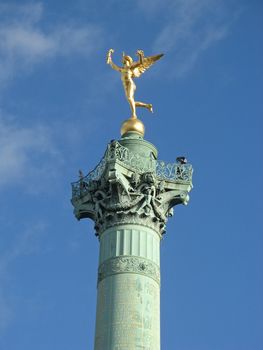 close-up of the golden angel on the column at place de la Bastille in Paris