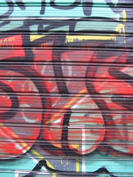 an image of colored graffiti on a shop