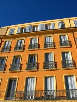 Frontage of a colored building in Provence