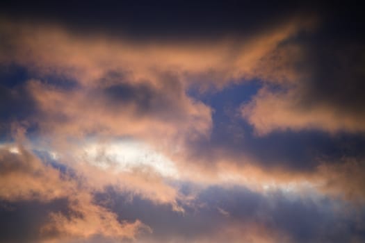 Red clouds in blue sky at sunset in Maui, Hawaii, USA.