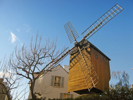 View of The mill "Moulin de la Galette" in Paris